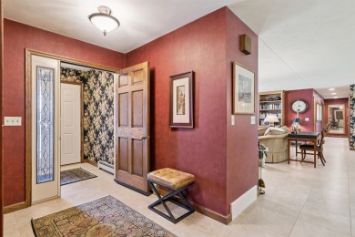 Step into timeless elegance with this beautifully crafted home on Waukon Golf and Country Club in Iowa - for sale on GolfHomes.com, golf home, golf lot