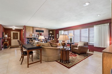 Step into timeless elegance with this beautifully crafted home on Waukon Golf and Country Club in Iowa - for sale on GolfHomes.com, golf home, golf lot