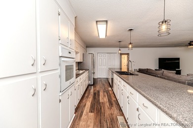 Spacious Ranch on the 12th Fairway in Carolina Trace! Welcome to on Carolina Trace Country Club in North Carolina - for sale on GolfHomes.com, golf home, golf lot