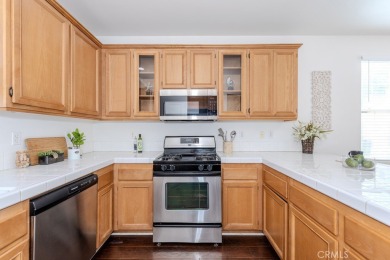 Detached single-family home in Dos Lagos within the Citrus on Glen Ivy Golf Club in California - for sale on GolfHomes.com, golf home, golf lot