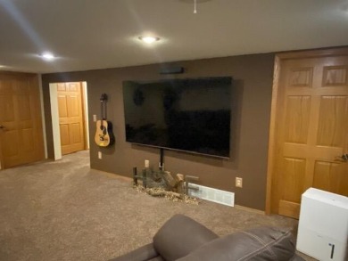 Take a look at this attractive ranch style home located adjacent on Split Rock Country Club in South Dakota - for sale on GolfHomes.com, golf home, golf lot