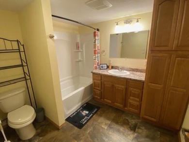 Take a look at this attractive ranch style home located adjacent on Split Rock Country Club in South Dakota - for sale on GolfHomes.com, golf home, golf lot