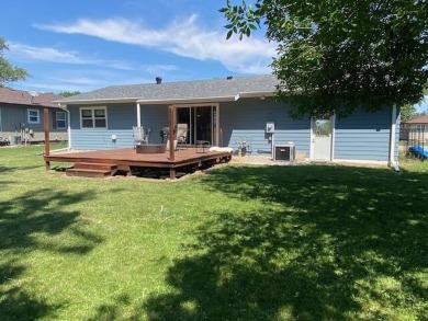Take a look at this attractive ranch style home located adjacent on Split Rock Country Club in South Dakota - for sale on GolfHomes.com, golf home, golf lot