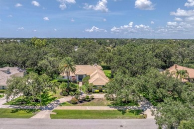 Prepare to fall in love with this exquisite 4-bedroom on Laurel Oak Country Club in Florida - for sale on GolfHomes.com, golf home, golf lot