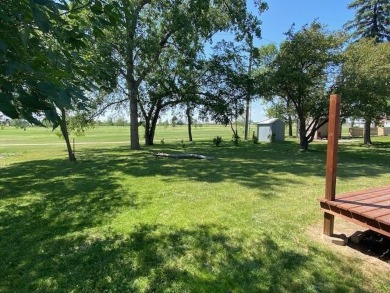 Take a look at this attractive ranch style home located adjacent on Split Rock Country Club in South Dakota - for sale on GolfHomes.com, golf home, golf lot