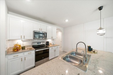 Welcome to this stunning 4-bedroom, 2-bath, 2-car garage home on Lake Diamond Golf and Country Club in Florida - for sale on GolfHomes.com, golf home, golf lot