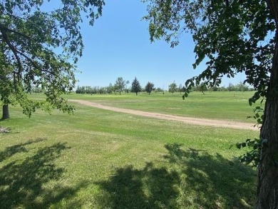 Take a look at this attractive ranch style home located adjacent on Split Rock Country Club in South Dakota - for sale on GolfHomes.com, golf home, golf lot