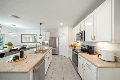 Welcome to this stunning 4-bedroom, 2-bath, 2-car garage home on Lake Diamond Golf and Country Club in Florida - for sale on GolfHomes.com, golf home, golf lot