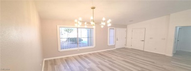 Fully updated Reno model with rare split bedrooms in Sun City on Highland Falls Golf Club in Nevada - for sale on GolfHomes.com, golf home, golf lot