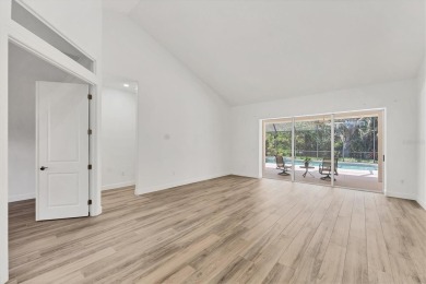 Prepare to fall in love with this exquisite 4-bedroom on Laurel Oak Country Club in Florida - for sale on GolfHomes.com, golf home, golf lot