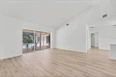 Prepare to fall in love with this exquisite 4-bedroom on Laurel Oak Country Club in Florida - for sale on GolfHomes.com, golf home, golf lot