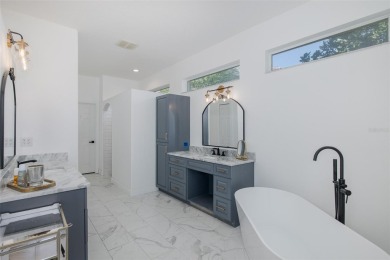 CHAMPIONS CLUB SHOWSTOPPER! This Luxury Built GOLF COURSE Home on Fox Hollow Golf Club in Florida - for sale on GolfHomes.com, golf home, golf lot