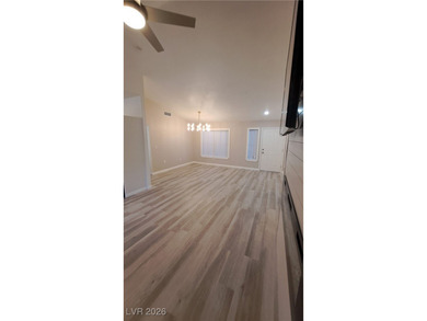 Fully updated Reno model with rare split bedrooms in Sun City on Highland Falls Golf Club in Nevada - for sale on GolfHomes.com, golf home, golf lot