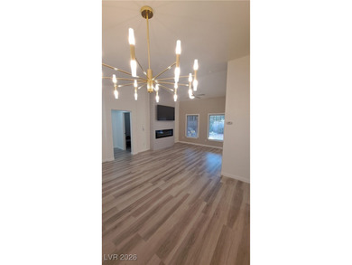 Fully updated Reno model with rare split bedrooms in Sun City on Highland Falls Golf Club in Nevada - for sale on GolfHomes.com, golf home, golf lot