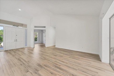Prepare to fall in love with this exquisite 4-bedroom on Laurel Oak Country Club in Florida - for sale on GolfHomes.com, golf home, golf lot