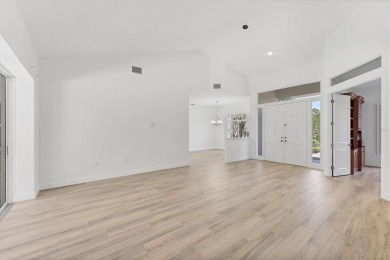 Prepare to fall in love with this exquisite 4-bedroom on Laurel Oak Country Club in Florida - for sale on GolfHomes.com, golf home, golf lot