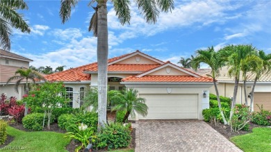 You must see this elegantly appointed home with its open floor on Estero Country Club in Florida - for sale on GolfHomes.com, golf home, golf lot