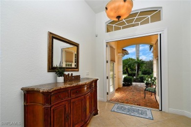 You must see this elegantly appointed home with its open floor on Estero Country Club in Florida - for sale on GolfHomes.com, golf home, golf lot