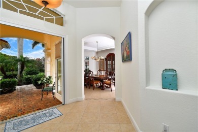 You must see this elegantly appointed home with its open floor on Estero Country Club in Florida - for sale on GolfHomes.com, golf home, golf lot