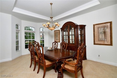 You must see this elegantly appointed home with its open floor on Estero Country Club in Florida - for sale on GolfHomes.com, golf home, golf lot