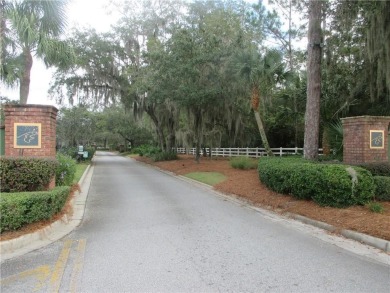Nice wooded homesite in this gated golf course on The Golf Club At Sanctuary Cove in Georgia - for sale on GolfHomes.com, golf home, golf lot