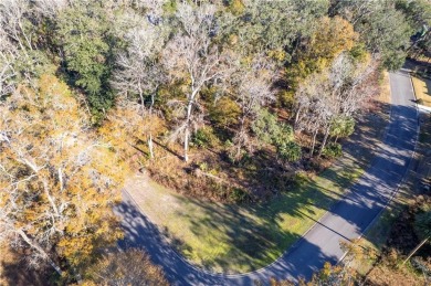 Nice wooded homesite in this gated golf course on The Golf Club At Sanctuary Cove in Georgia - for sale on GolfHomes.com, golf home, golf lot