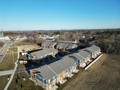 Estimated completion of March 2024. Individual lots allows for on Lake Mills Golf Course in Wisconsin - for sale on GolfHomes.com, golf home, golf lot