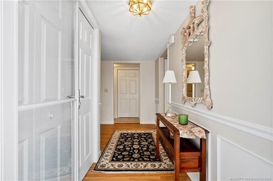 This spectacular furnished turnkey first-floor 2BR/2BA residence on Miles Grant Country Club in Florida - for sale on GolfHomes.com, golf home, golf lot