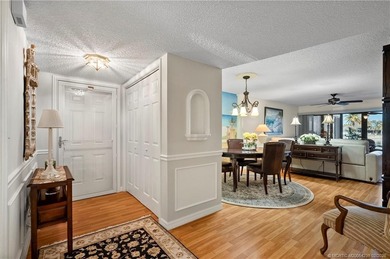 This spectacular furnished turnkey first-floor 2BR/2BA residence on Miles Grant Country Club in Florida - for sale on GolfHomes.com, golf home, golf lot