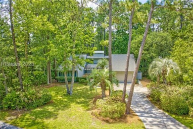 Estate Sale. Full size wooded homesite with golf views behind on Dolphin Head Golf Club in South Carolina - for sale on GolfHomes.com, golf home, golf lot
