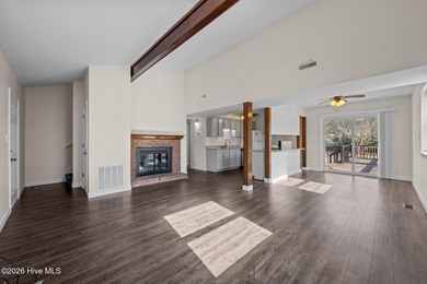 What a deal! Welcome to this 3-bedroom, 2-bath contemporary on Harbour Point Golf Club in North Carolina - for sale on GolfHomes.com, golf home, golf lot