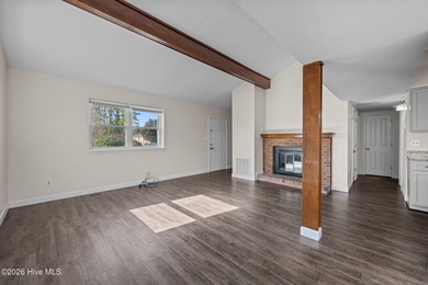 What a deal! Welcome to this 3-bedroom, 2-bath contemporary on Harbour Point Golf Club in North Carolina - for sale on GolfHomes.com, golf home, golf lot