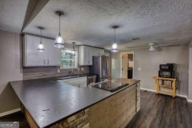 Charming 3-bedroom, 2-bath home in the desirable Turtle Cove on Turtle Cove Golf Course in Georgia - for sale on GolfHomes.com, golf home, golf lot