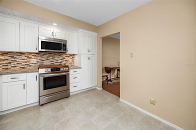 Enjoy turnkey, maintenance-free living in this beautifully on On Top Of The World Golf Course in Florida - for sale on GolfHomes.com, golf home, golf lot