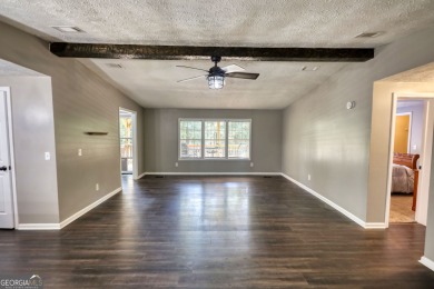 Charming 3-bedroom, 2-bath home in the desirable Turtle Cove on Turtle Cove Golf Course in Georgia - for sale on GolfHomes.com, golf home, golf lot