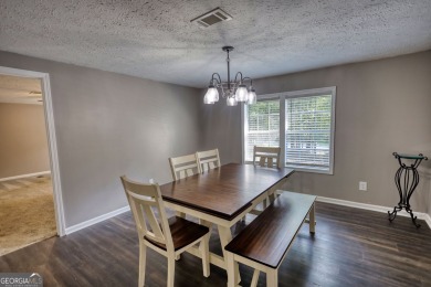 Charming 3-bedroom, 2-bath home in the desirable Turtle Cove on Turtle Cove Golf Course in Georgia - for sale on GolfHomes.com, golf home, golf lot