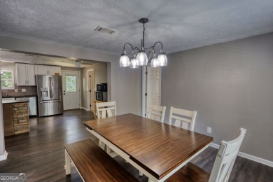 Charming 3-bedroom, 2-bath home in the desirable Turtle Cove on Turtle Cove Golf Course in Georgia - for sale on GolfHomes.com, golf home, golf lot