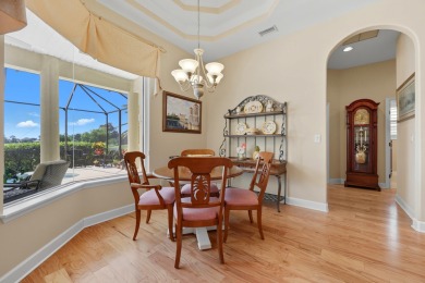 Discover Refined Living In This 3-bedroom,3-bath Home With A on Marsh Creek Country Club in Florida - for sale on GolfHomes.com, golf home, golf lot
