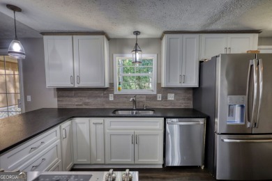Charming 3-bedroom, 2-bath home in the desirable Turtle Cove on Turtle Cove Golf Course in Georgia - for sale on GolfHomes.com, golf home, golf lot
