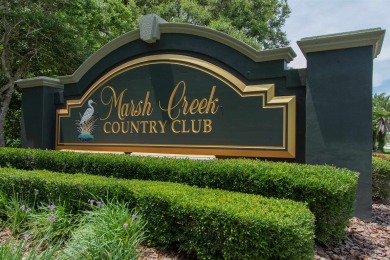 Discover Refined Living In This 3-bedroom,3-bath Home With A on Marsh Creek Country Club in Florida - for sale on GolfHomes.com, golf home, golf lot