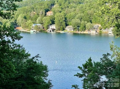 GREAT RENTAL HISTORY on this recently renovated townhome with a on Rumbling Bald Resort on Lake Lure in North Carolina - for sale on GolfHomes.com, golf home, golf lot