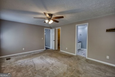 Charming 3-bedroom, 2-bath home in the desirable Turtle Cove on Turtle Cove Golf Course in Georgia - for sale on GolfHomes.com, golf home, golf lot