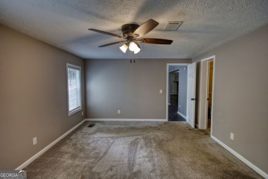 Charming 3-bedroom, 2-bath home in the desirable Turtle Cove on Turtle Cove Golf Course in Georgia - for sale on GolfHomes.com, golf home, golf lot