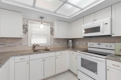 Do you like to play Golf? Are you looking for a place in a quiet on Palm Harbor Golf Club in Florida - for sale on GolfHomes.com, golf home, golf lot