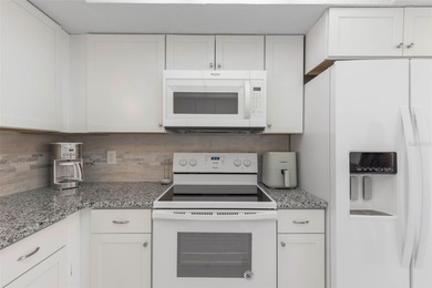 Do you like to play Golf? Are you looking for a place in a quiet on Palm Harbor Golf Club in Florida - for sale on GolfHomes.com, golf home, golf lot