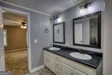 Charming 3-bedroom, 2-bath home in the desirable Turtle Cove on Turtle Cove Golf Course in Georgia - for sale on GolfHomes.com, golf home, golf lot