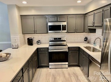 GREAT RENTAL HISTORY on this recently renovated townhome with a on Rumbling Bald Resort on Lake Lure in North Carolina - for sale on GolfHomes.com, golf home, golf lot