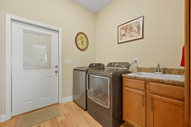 Discover Refined Living In This 3-bedroom,3-bath Home With A on Marsh Creek Country Club in Florida - for sale on GolfHomes.com, golf home, golf lot