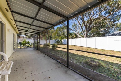 Do you like to play Golf? Are you looking for a place in a quiet on Palm Harbor Golf Club in Florida - for sale on GolfHomes.com, golf home, golf lot