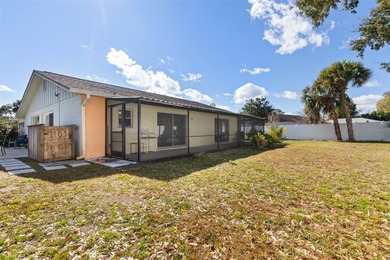 Do you like to play Golf? Are you looking for a place in a quiet on Palm Harbor Golf Club in Florida - for sale on GolfHomes.com, golf home, golf lot